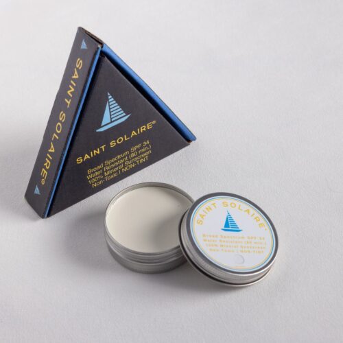 photo of Saint Solaire Non Tint Broad Spectrum Sunscreen SPF 34 tin and packaging